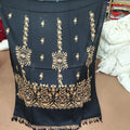 Women's black shawl with gold floral embroidery, full view